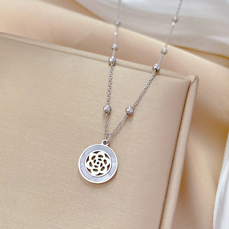 Minimalist Geometric Titanium Steel Necklace with Gold Plating for Women Featuring Camellia and Seashell Design Locket Pendant
