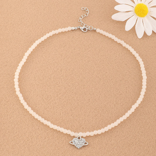 Collar minimalista con colgante de corazón y planeta para niñas con cuentas de resina e incrustaciones de diamantes de imitación en cadena de bolas redondas