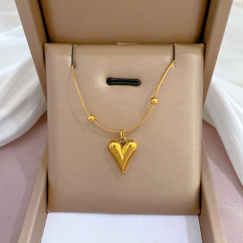 Collana con pendente geometrico minimalista in acciaio al titanio placcato per donna