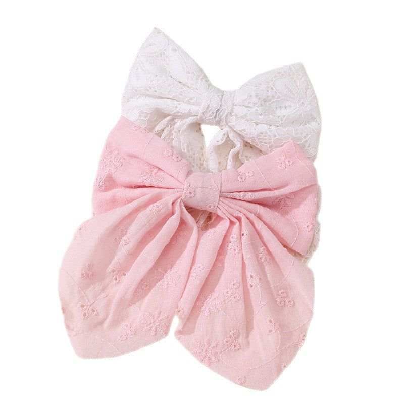 Graziosa molletta per capelli rosa a forma di fiocco per bambine con dettagli a volant e in rete, realizzata in resina plastica con chiusura a molla