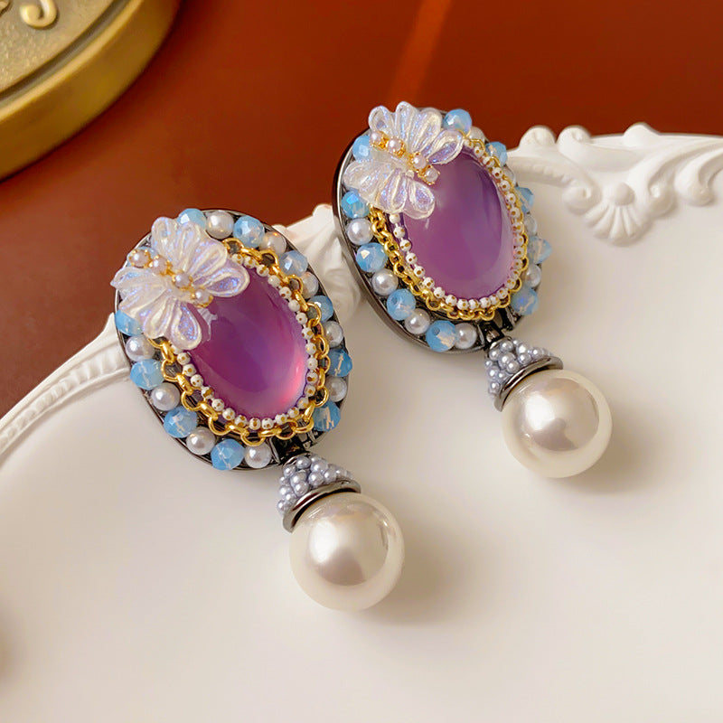 Orecchini a farfalla vintage in resina con cristalli e perle su base in lega placcata argento da donna