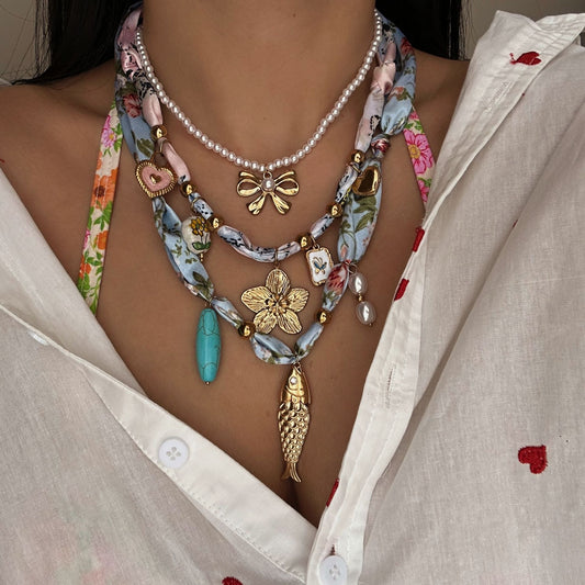 Collana in acciaio inossidabile placcato con cuore floreale casual e ciondolo in ceramica da donna