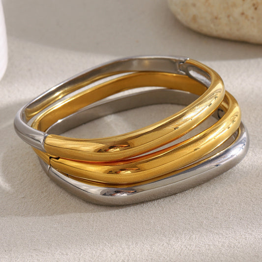 Pulsera Minimalista Redonda Irregular para Mujer de Acero Inoxidable con Baño de Oro de 18K