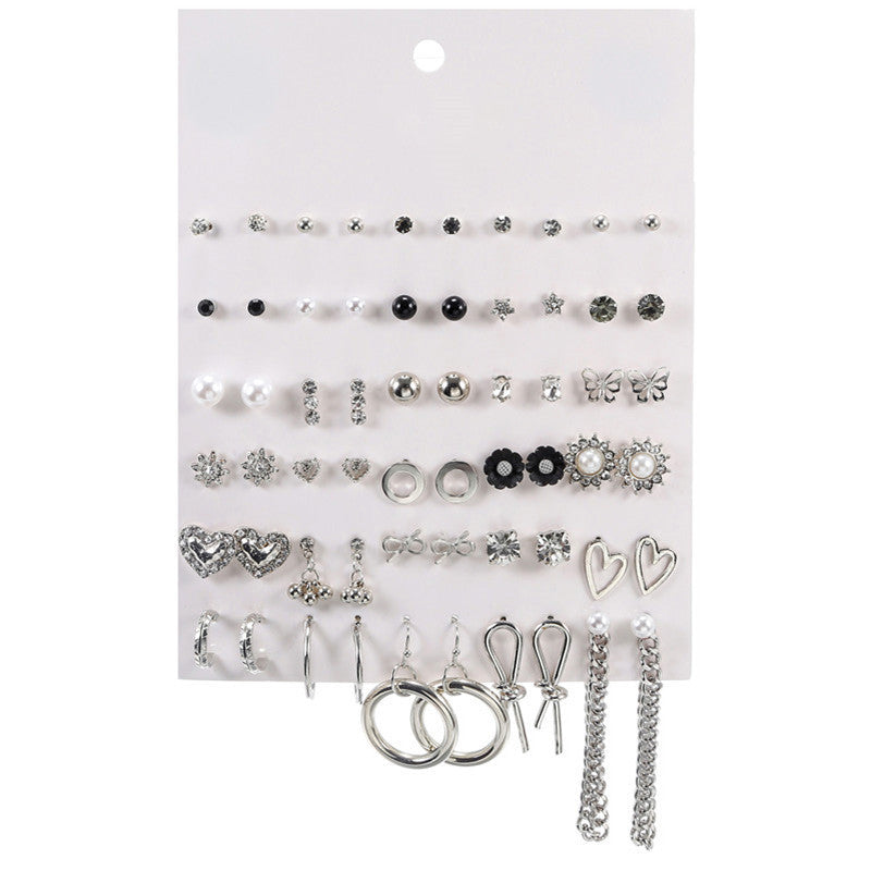 Geometric Asymmetric Micro-inlay Cubic Zirconia and Pearl Titanium Steel Earrings Set with Bow Design