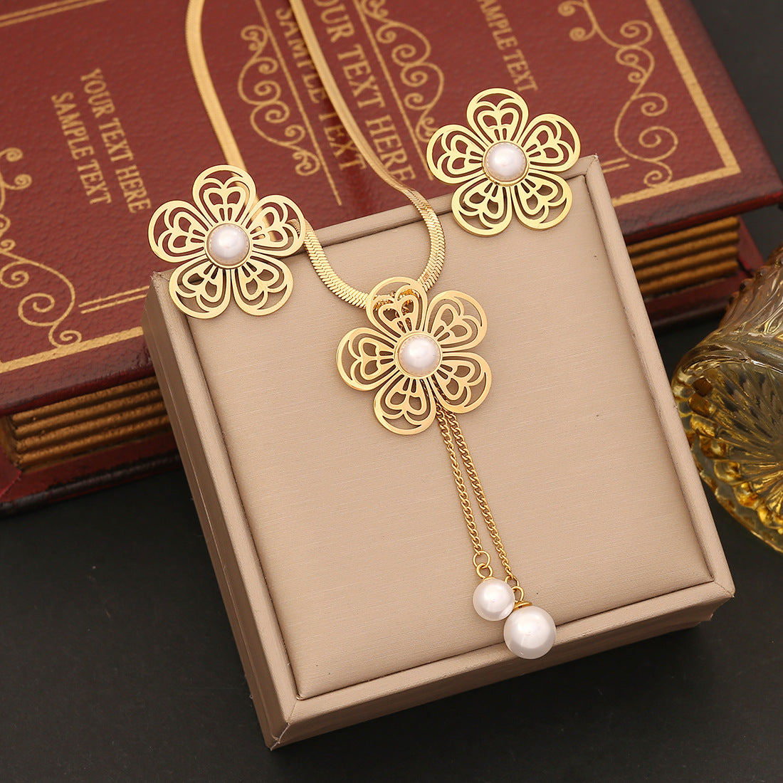 Conjunto de collar con colgante irregular geométrico con dije de flor de acero inoxidable y detalle de borla para mujer