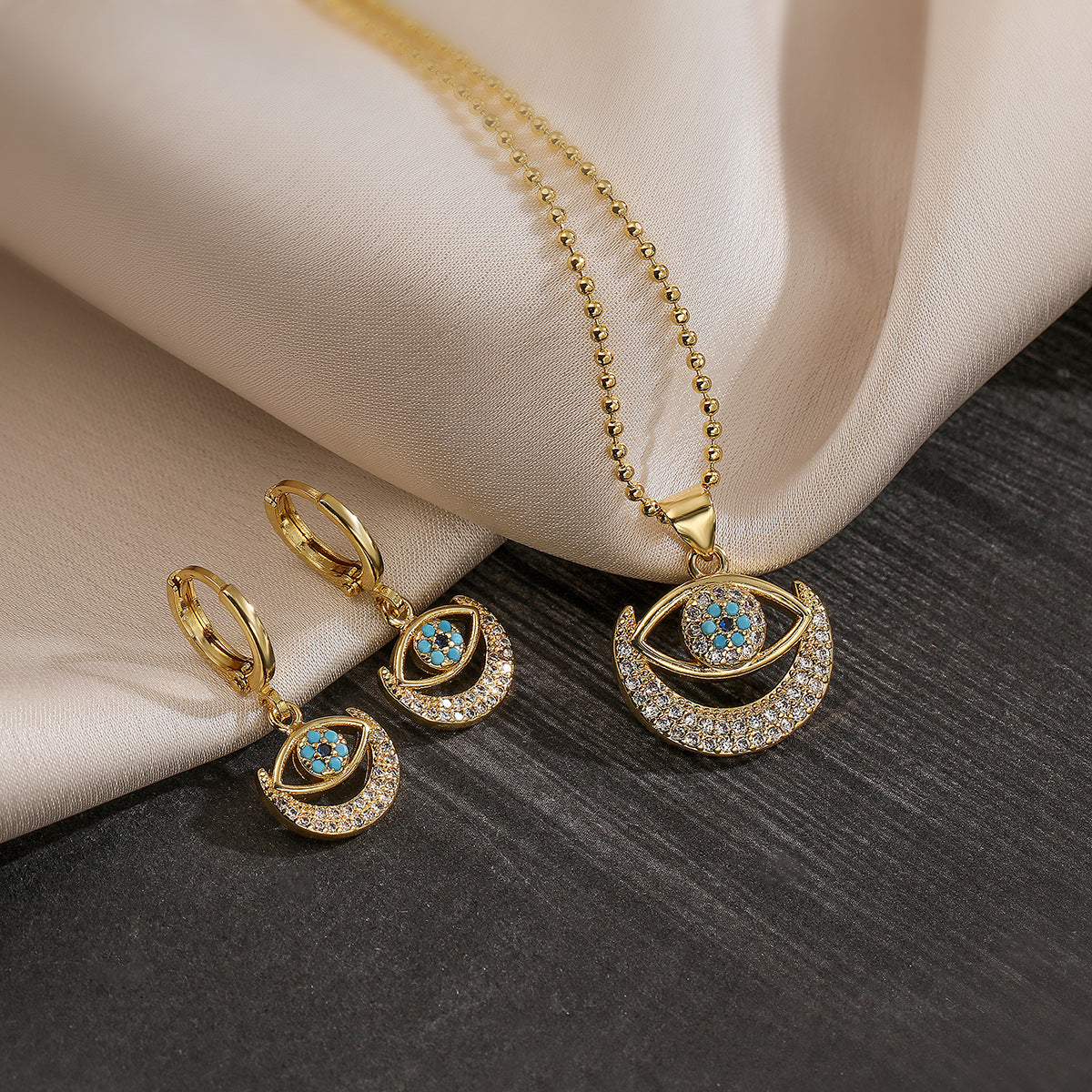 Set collana e orecchini da donna con ciondolo a occhio di Allah geometrico e zirconi, in rame placcato oro 18 carati, stile minimalista