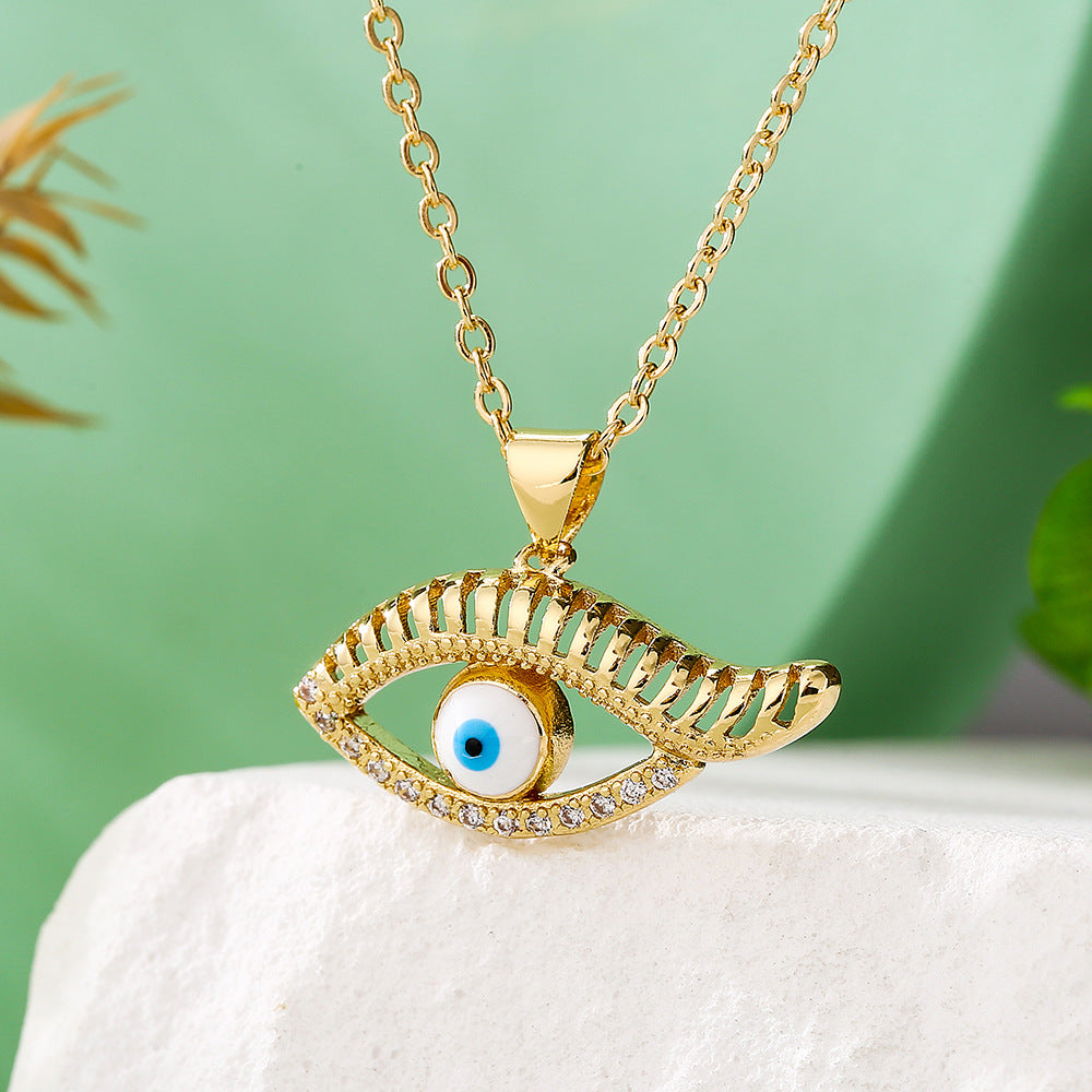 Collana con pendente a occhio blu geometrico minimalista da donna con base in rame e placcatura in vero oro con accenti di zirconi
