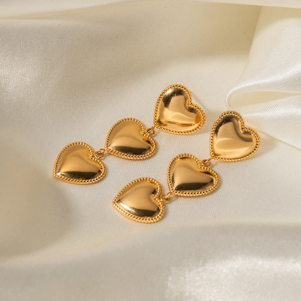 Pendientes de borla en forma de corazón de acero inoxidable con baño de oro de 18 quilates de moda con diseño de borde en capas para mujer
