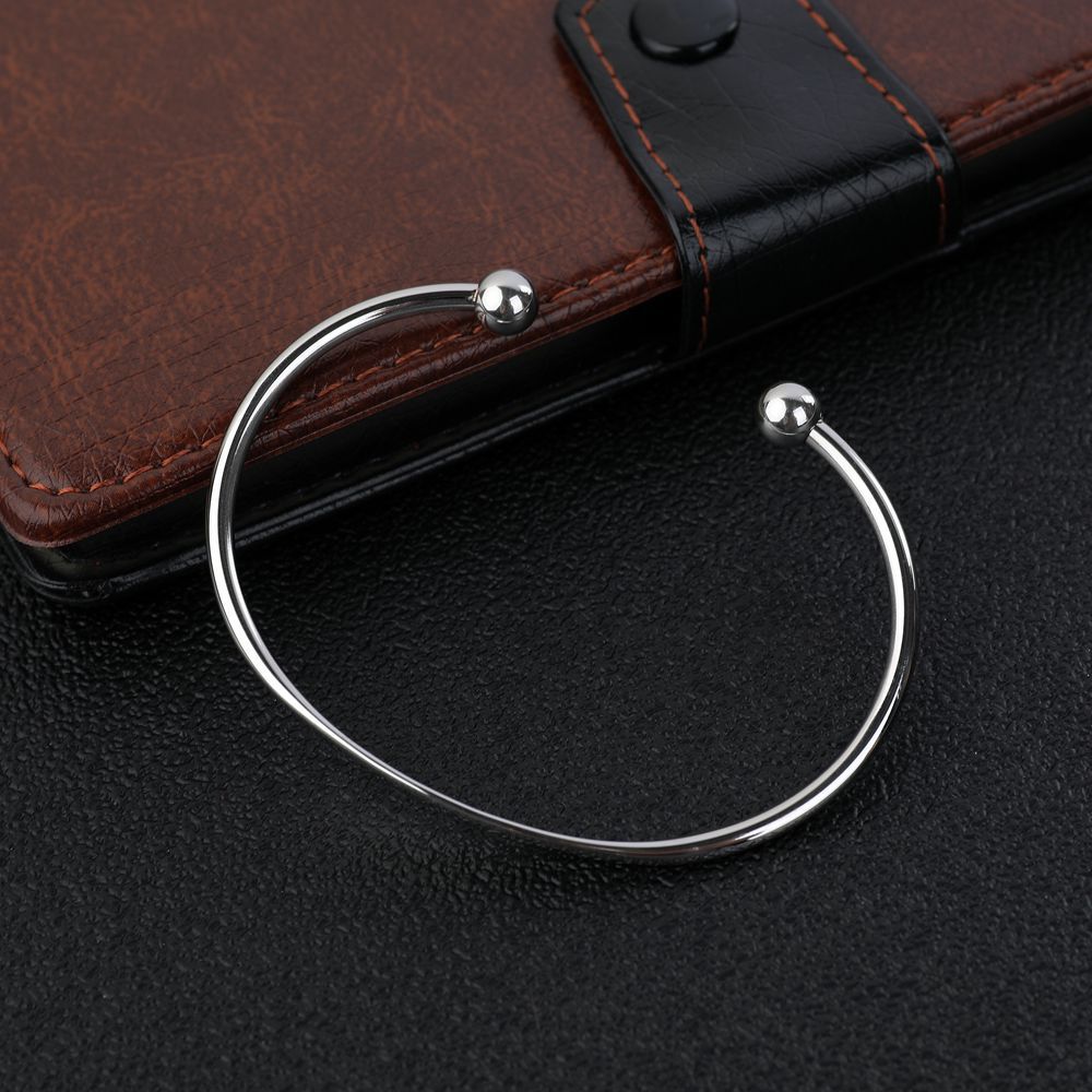 Bracciale a C minimal in acciaio inossidabile lucido da donna