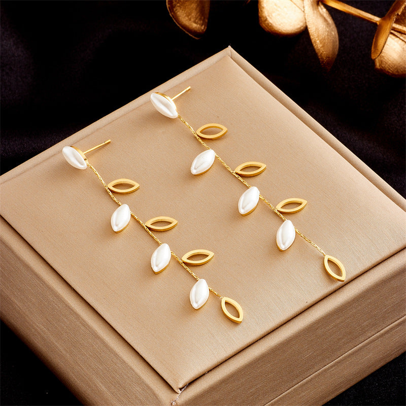 Minimalist Elegant Pearl-Embellished Hollow Leaf Dangle Stud Earrings in Titanium Steel with Plated Finish