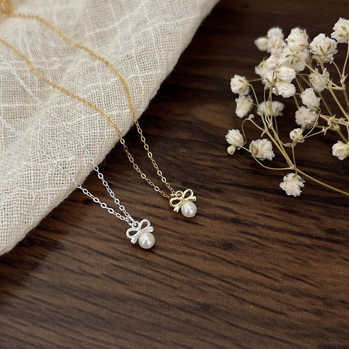 Minimalist Bow Knot Pendant Necklace in 925 Sterling Silver with Pearl Accents on Snake Chain