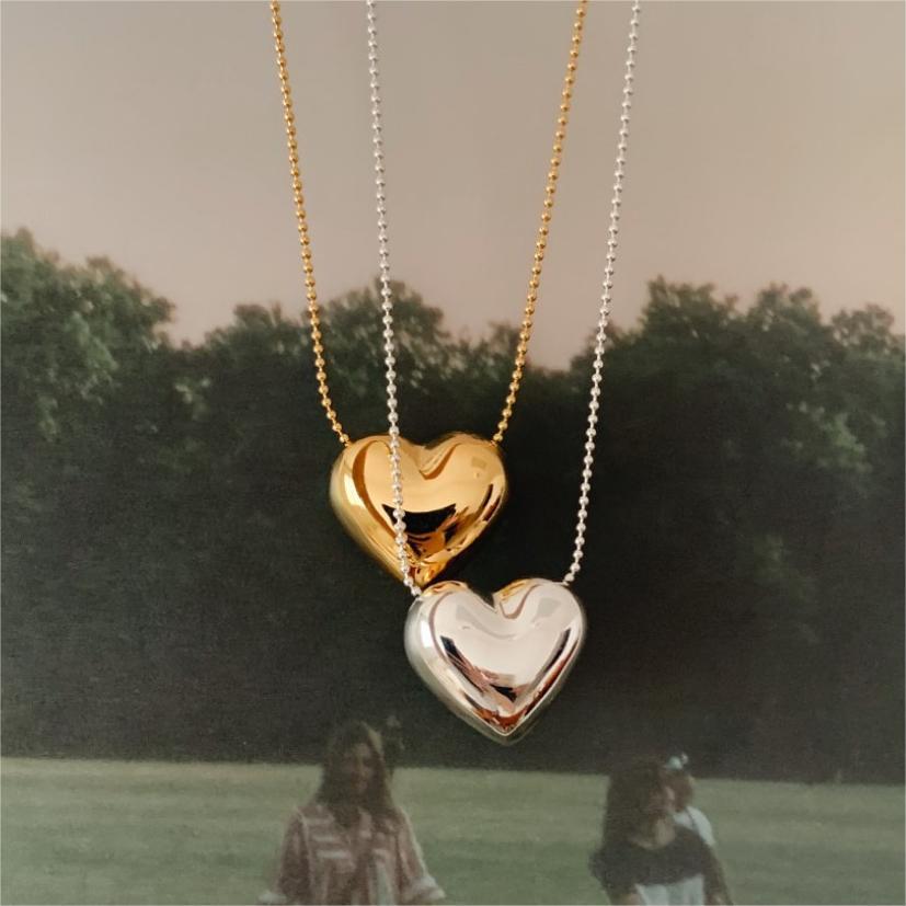 Collar minimalista con colgante de corazón en plata de ley 925 con cadena trenzada