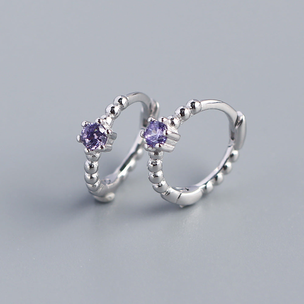 Orecchini a perno tondi con intarsi di diamanti in argento sterling 925
