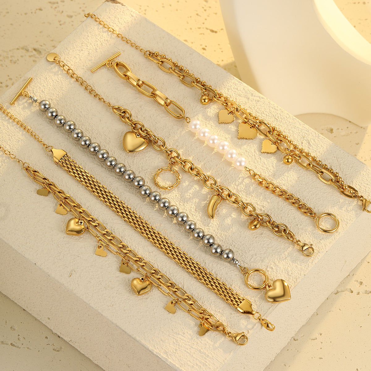Vintage-Inspired Women's Stainless Steel Plated Bracelet with Heart Pendant and Tassel Detail