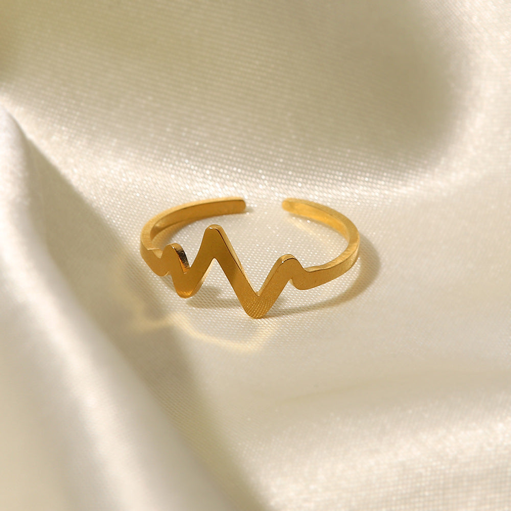 Anello da donna in acciaio al titanio placcato oro 18K, geometrico, minimalista, ispirato alla Francia, con design a battito cardiaco