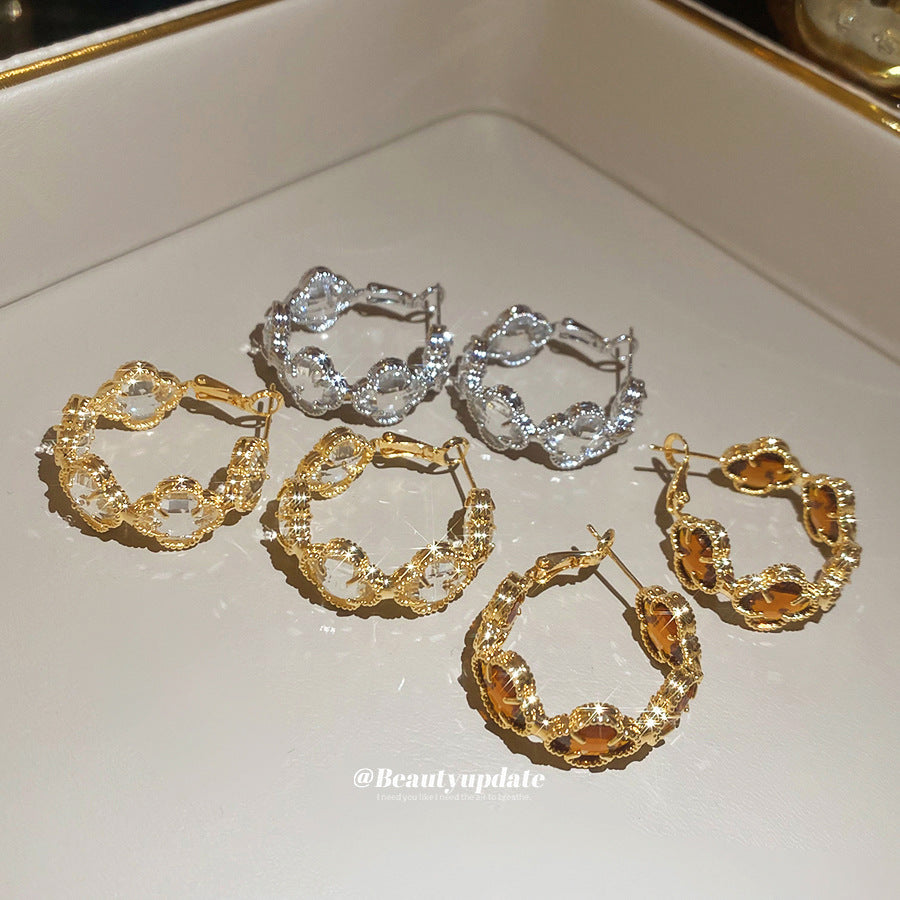 Orecchini francesi vintage floreali in cristallo con perni in acciaio placcato oro da donna