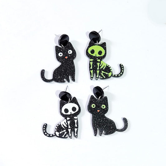 Pendientes de gato con temática de Halloween con ojos verdes y diseño de hueso Tachuelas acrílicas