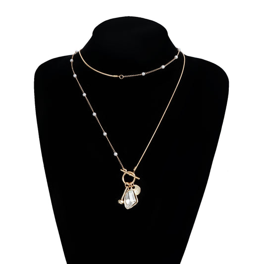 Collar con colgante de cristal facetado transparente con forma geométrica para mujer con base de aleación y acabado galvanizado, delicada cadena a la altura de la clavícula con cierre OT
