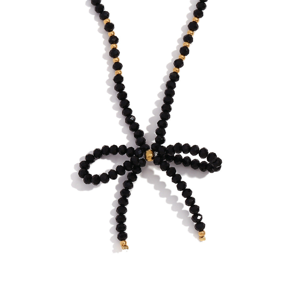 Collana con ciondolo minimalista a forma di fiocco in acciaio inossidabile con strass da donna