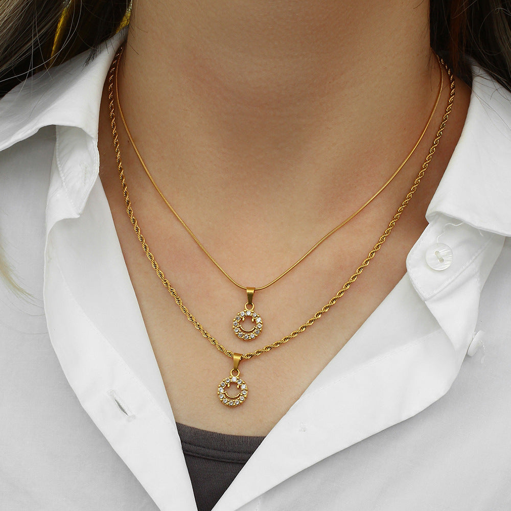 Fashionable Geometric Smile Pendant Necklace in Stainless Steel with 18K Gold Plating and Zircon Accents on Twisted Chain