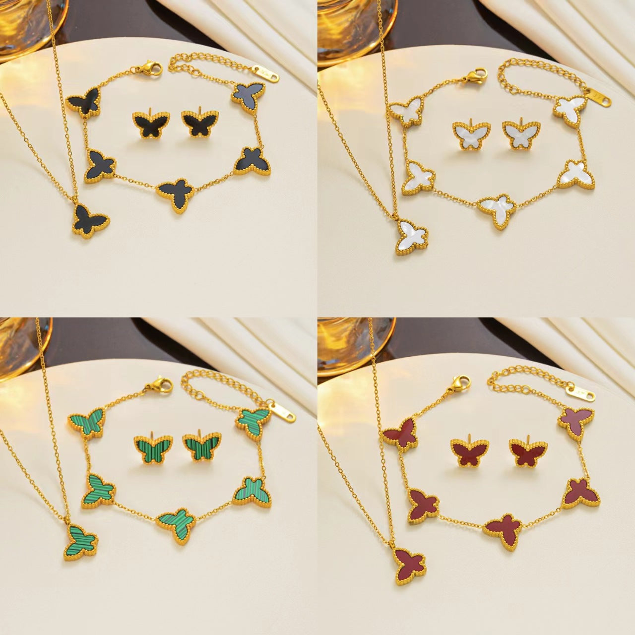 Set di collana, orecchini e bracciale minimalista con farfalla in acciaio al titanio con finitura placcata