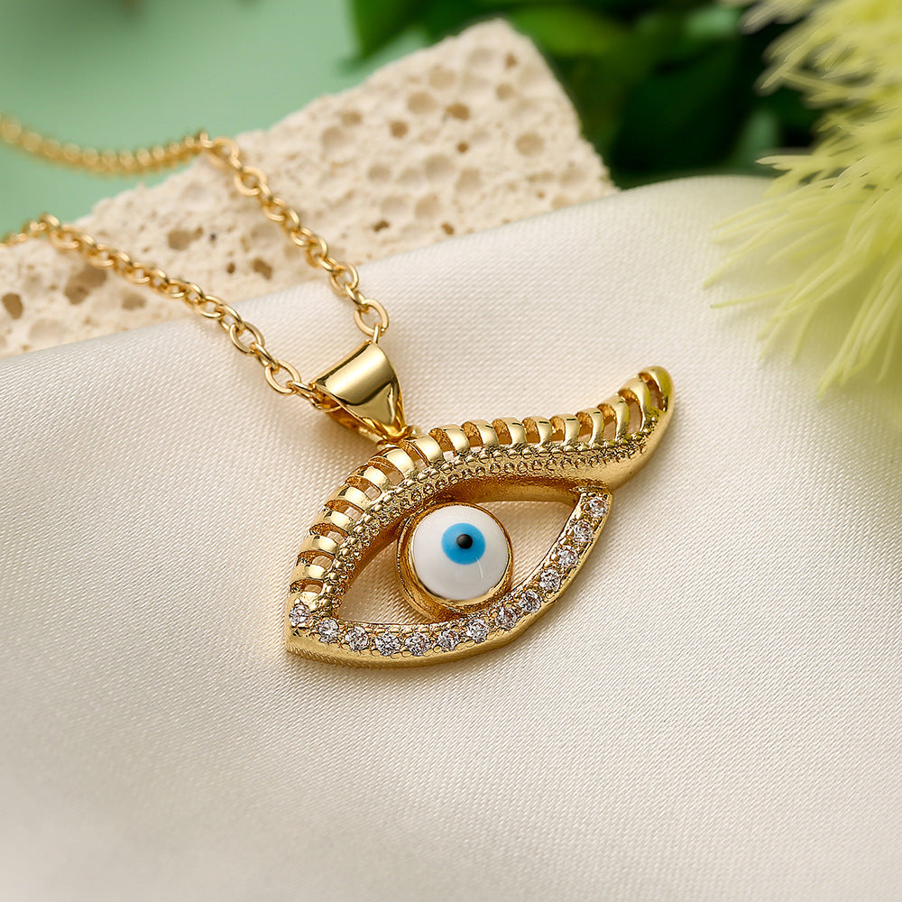 Collana con pendente a occhio blu geometrico minimalista da donna con base in rame e placcatura in vero oro con accenti di zirconi