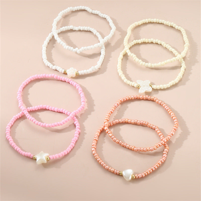 Braccialetto artigianale in stile bohémien con perline per bambini con ciondoli a forma di stella e cuore, perline di vetro colorate