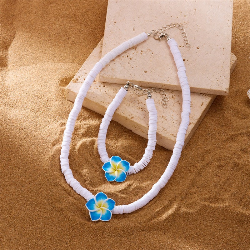 Elegante collar y pulsera de resina floral bohemia con cadena de cable para mujer