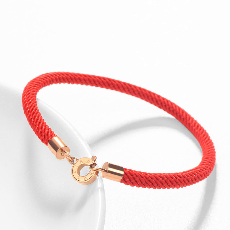 Bracciale da donna in stile geometrico in acciaio al titanio con cordino rosso, stile fattoria pastello