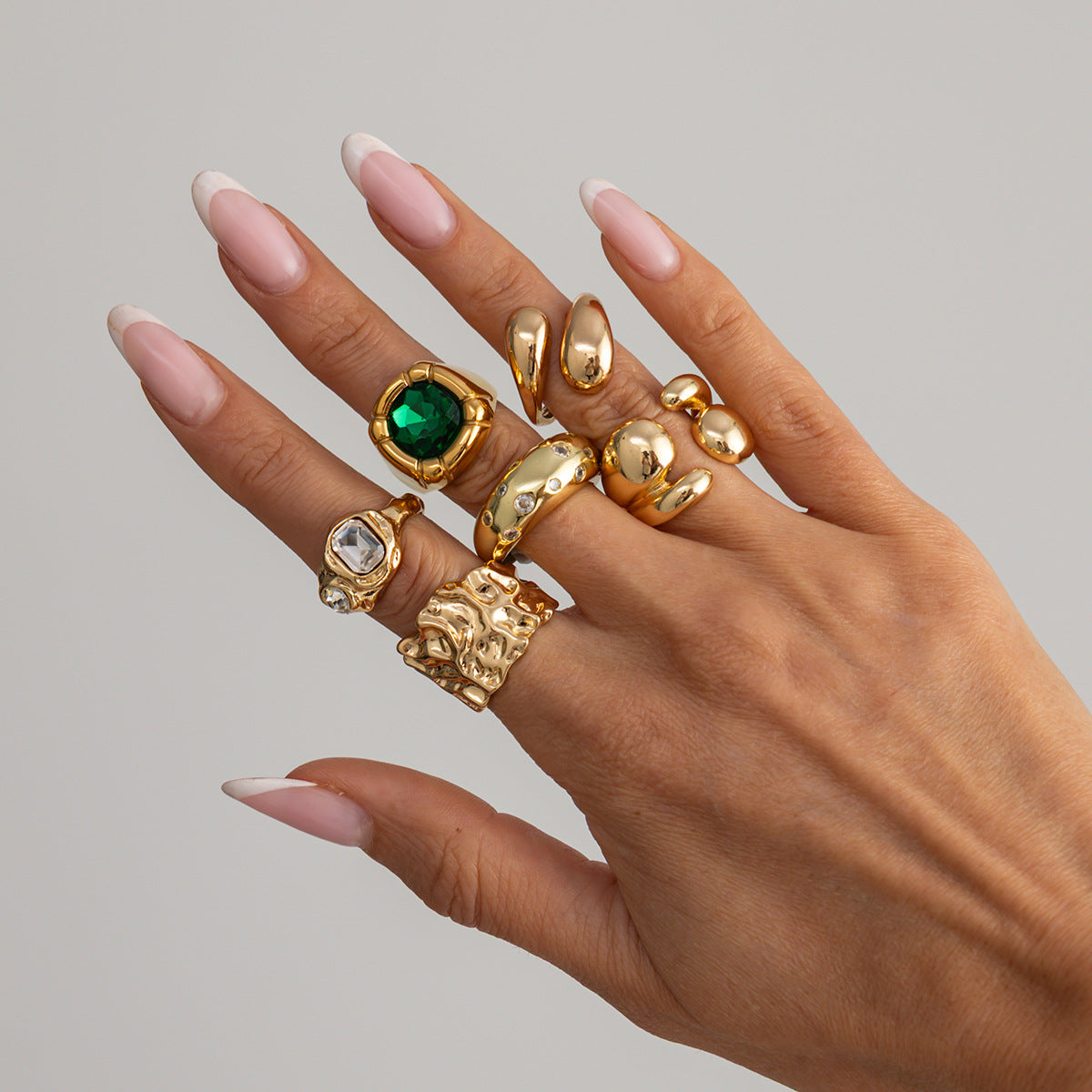 Luxury Elegant Geometric Oval Plated Zinc Alloy Ring with Gemstone Inlay Irregular Liquid Fold Design for Women