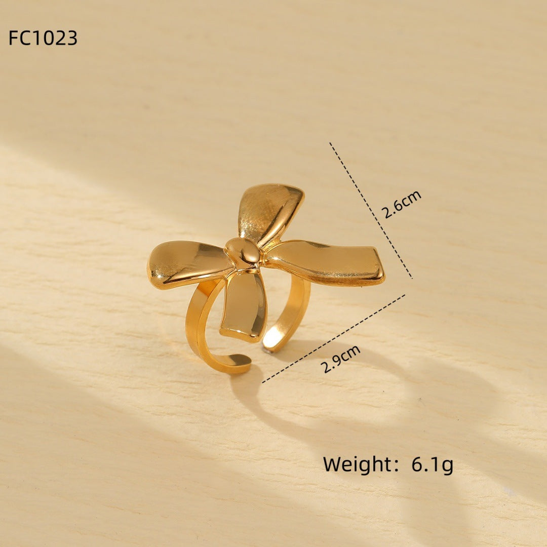 Elegantes Pendientes de Acero de Titanio con Forma de Lazo Bañados en Oro para Mujer