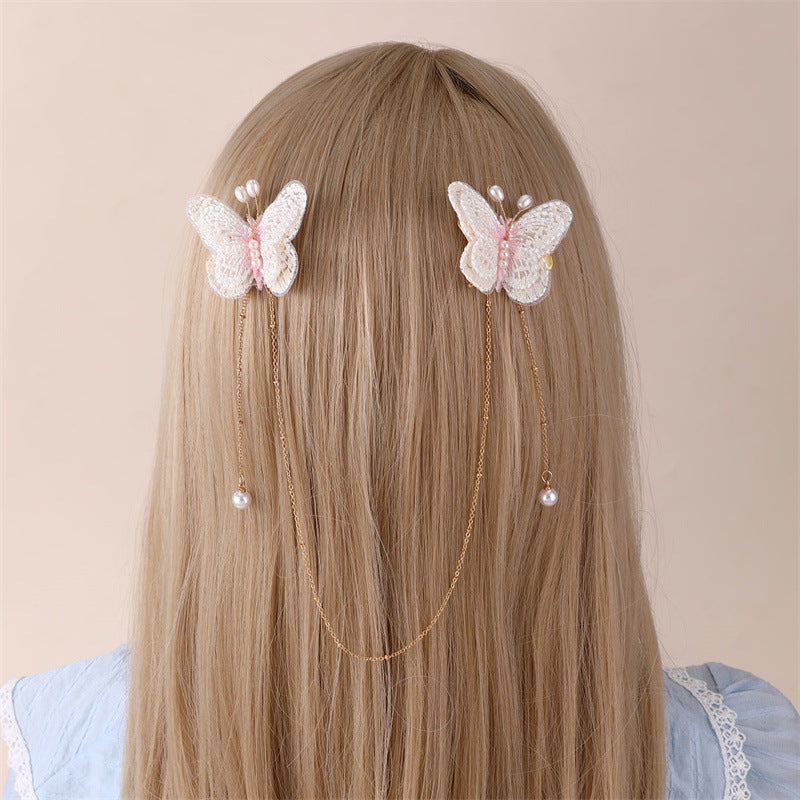 Fermaglio per capelli con fiocco a farfalla in stile naturale per bambini, con materiale in resina e dettaglio catena con nappina