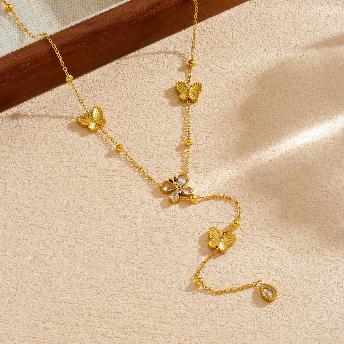 Elegant Gold Plated Stainless Steel Y-Chain Necklace with Rhinestone Floral and Star Charms