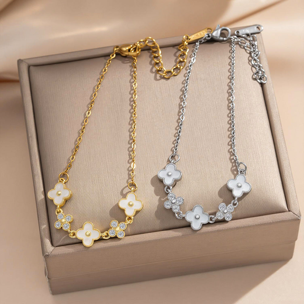 Bracciale da donna in acciaio al titanio placcato oro con zirconi intarsiati, motivo floreale e geometrico, stile pendolare, moda lusso leggero