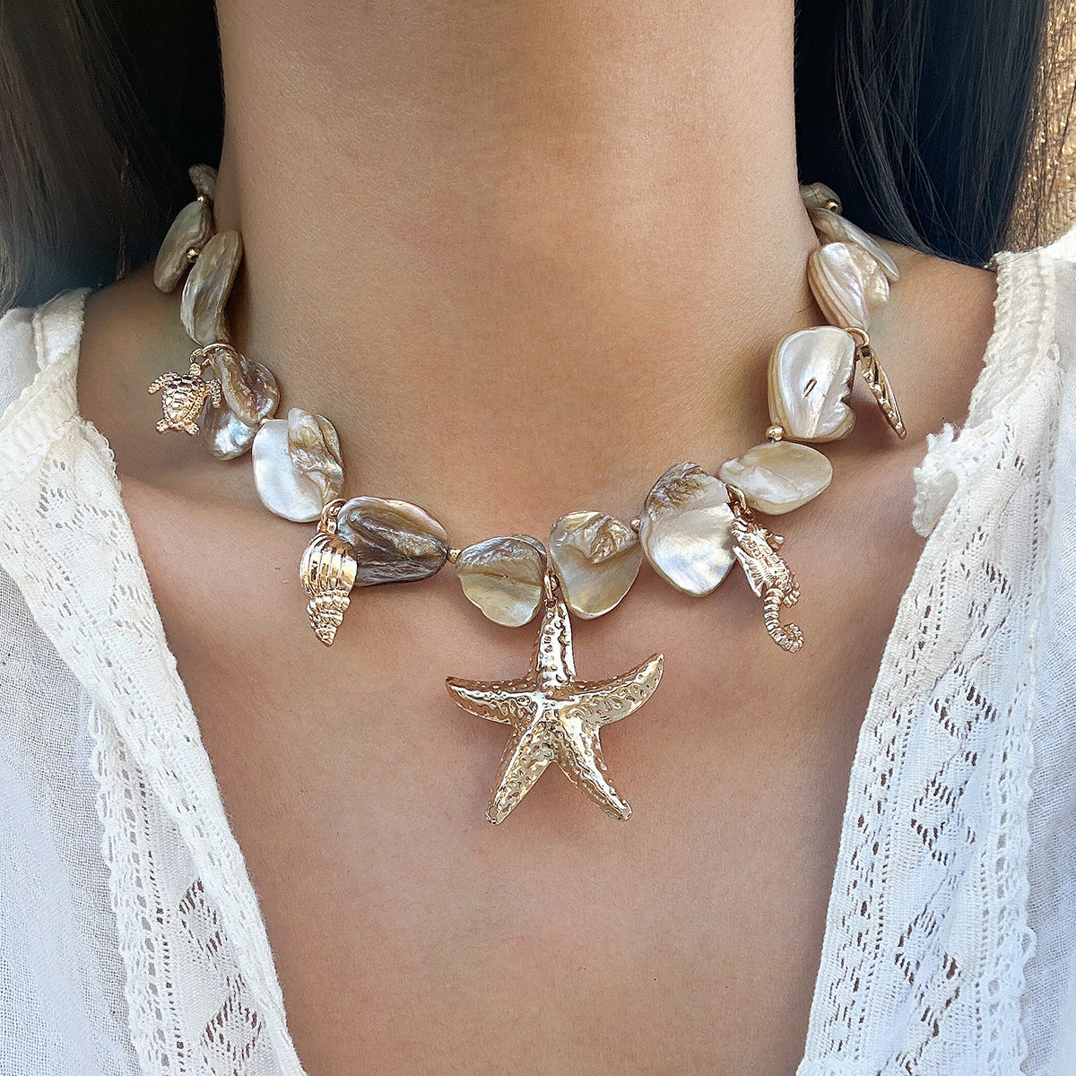 Collana pendente a stella con conchiglia minimalista in lega di zinco con finitura placcata da donna