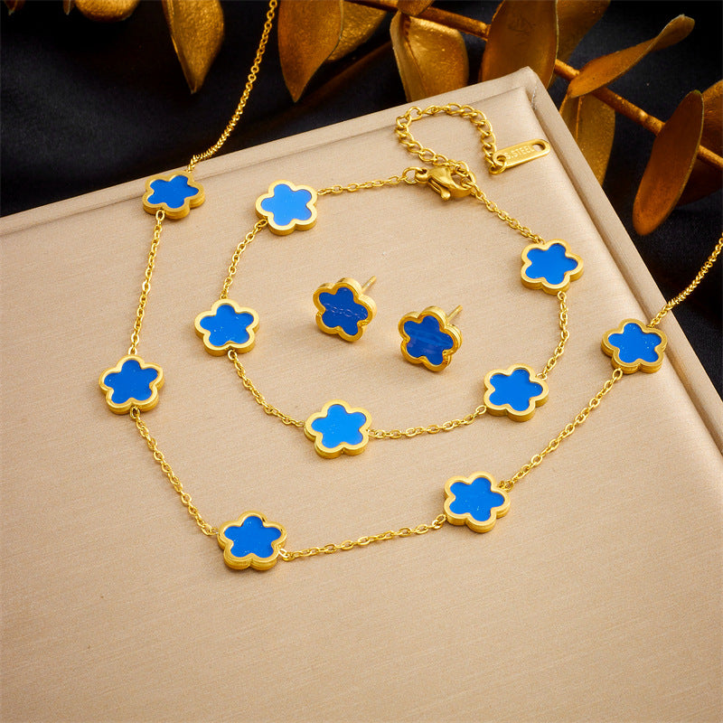 Set de pendientes, pulsera y collar chapados en acero inoxidable con diseño de flores vintage de cinco pétalos para mujer