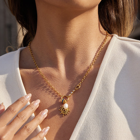Minimalist Spiral Sun Titanium Steel Pendant with Freshwater Pearl Plated Necklace for Women