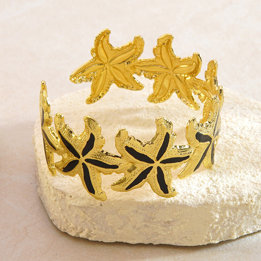Elegante Bracciale a Polsino in Acciaio Inossidabile con Stella Marina e Goccia d'Olio
