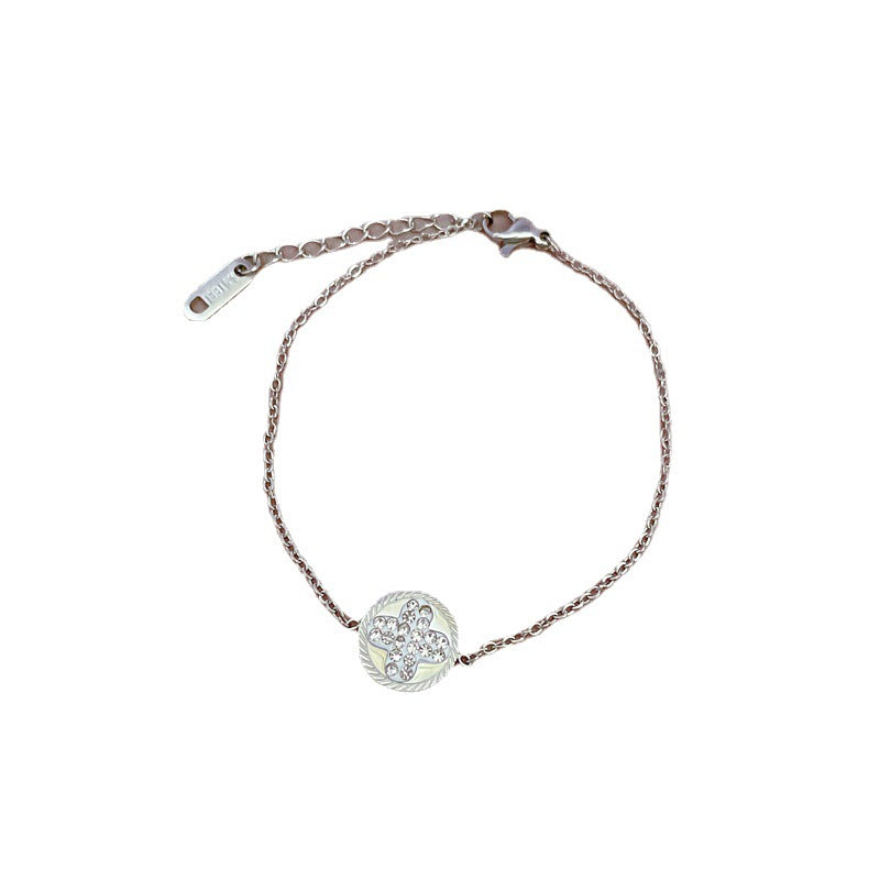 Bracciale da donna in acciaio al titanio placcato oro a forma di quadrifoglio stile vintage con strass intarsiati