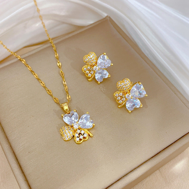 Parure di Orecchini e Collana in Rame Placcato con Zirconi Geometrici di Lusso