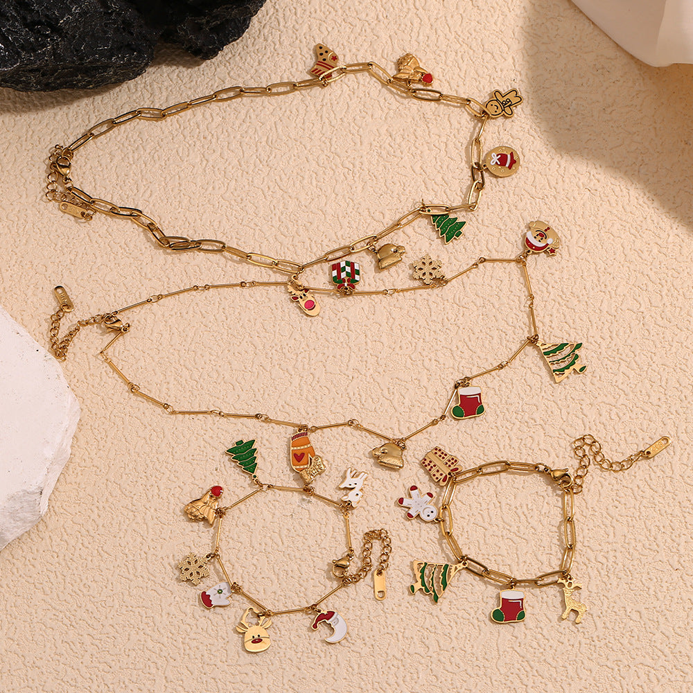 Collana con ciondolo a cartone animato natalizio carino da donna, in acciaio inossidabile con placcatura in oro 18 carati, catena a serpente con motivi a fiocco di neve, renna e campanella di Babbo Natale