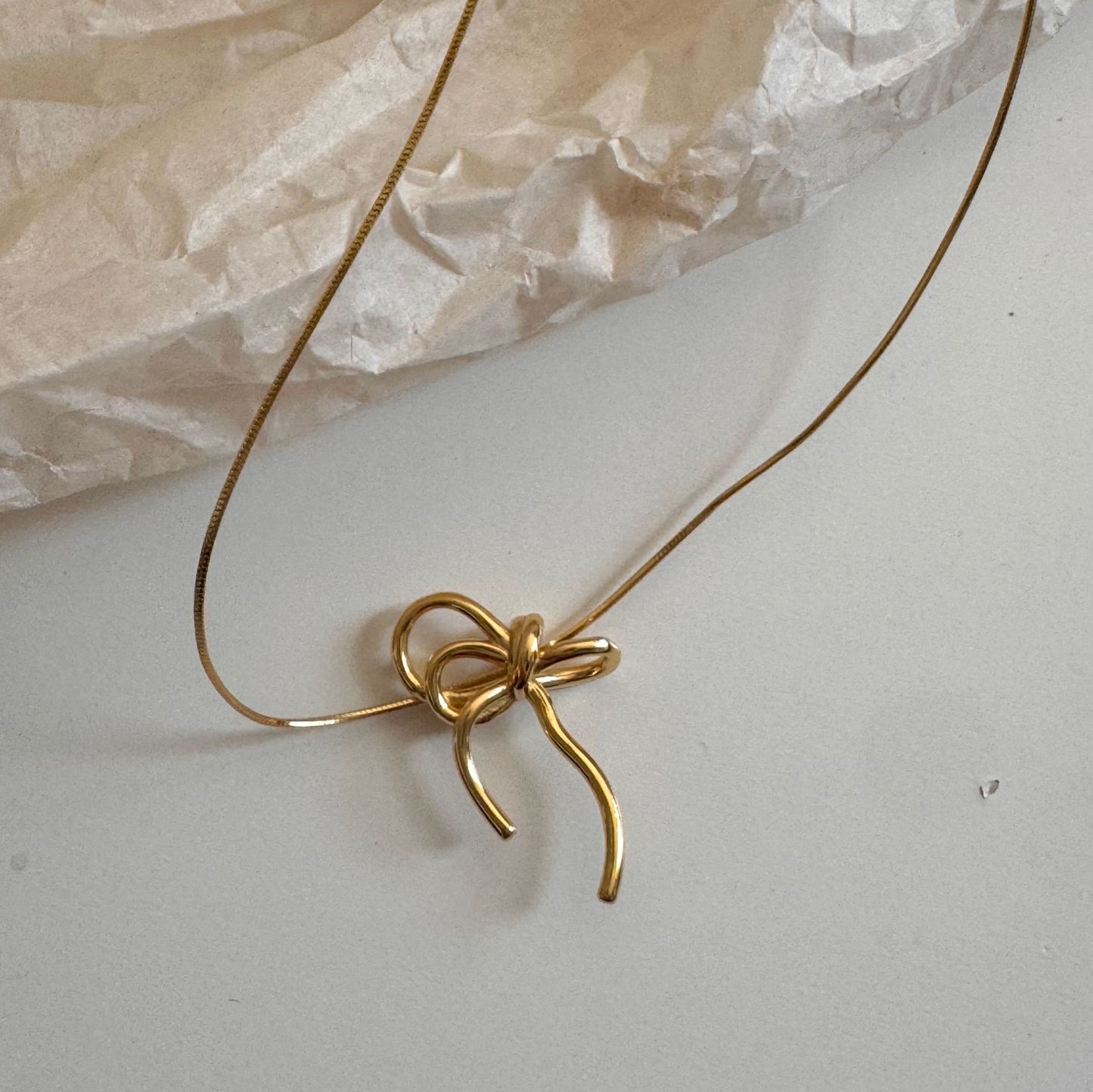 Minimalist Bow-Shaped 925 Sterling Silver Necklace with Plated Finish on Snake Chain
