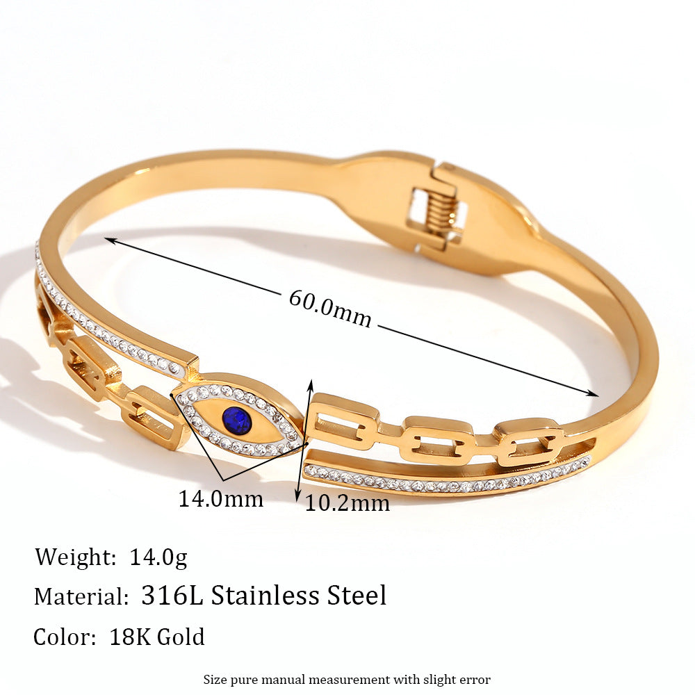 Bracciale minimalista di tendenza in acciaio inossidabile con placcatura in oro 18 carati e ciondolo a forma di occhio di Nazar micro-incastonato su chiusura a molla