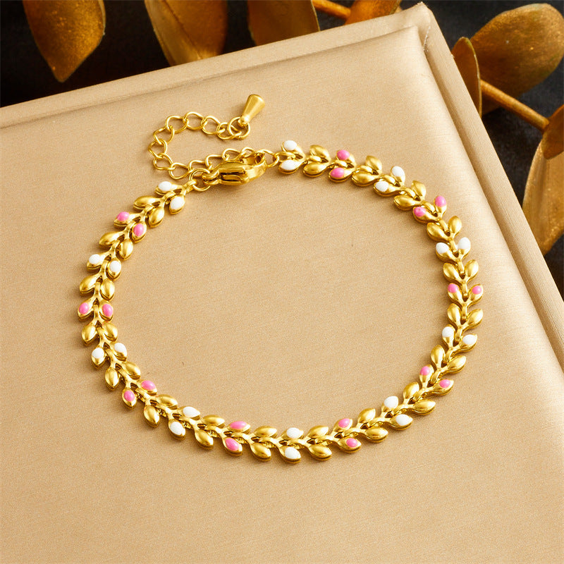 Bracciale da donna placcato oro minimalista in acciaio inossidabile con charm a foglia