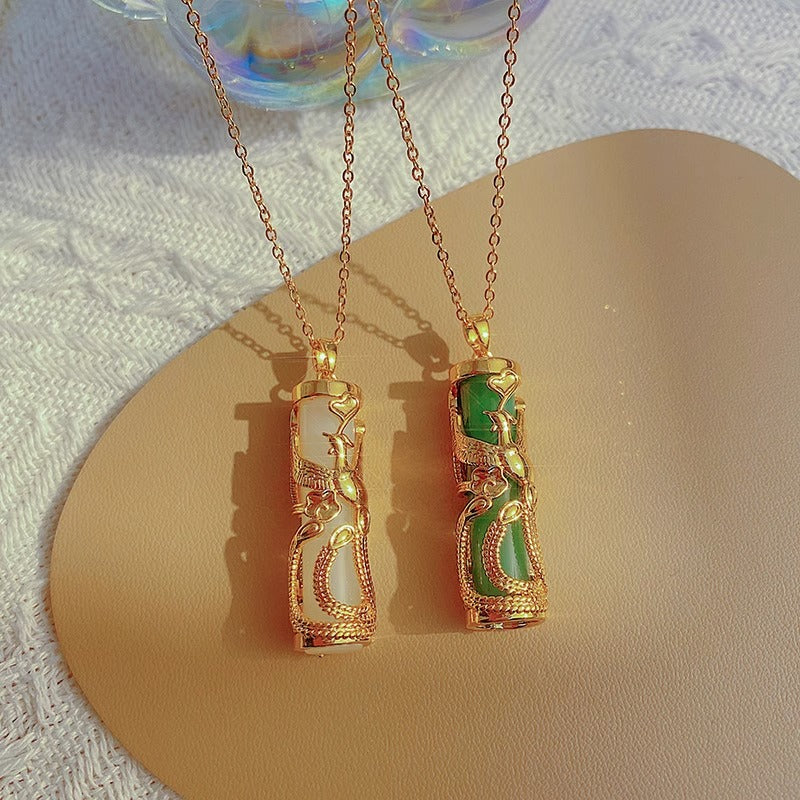 Collana Pendente Fenice Floreale Irregolare dal Design Originale in Acciaio Titanio Placcato Oro per Donna Unisex Minimalista Ciondolo a Medaglione Regalo