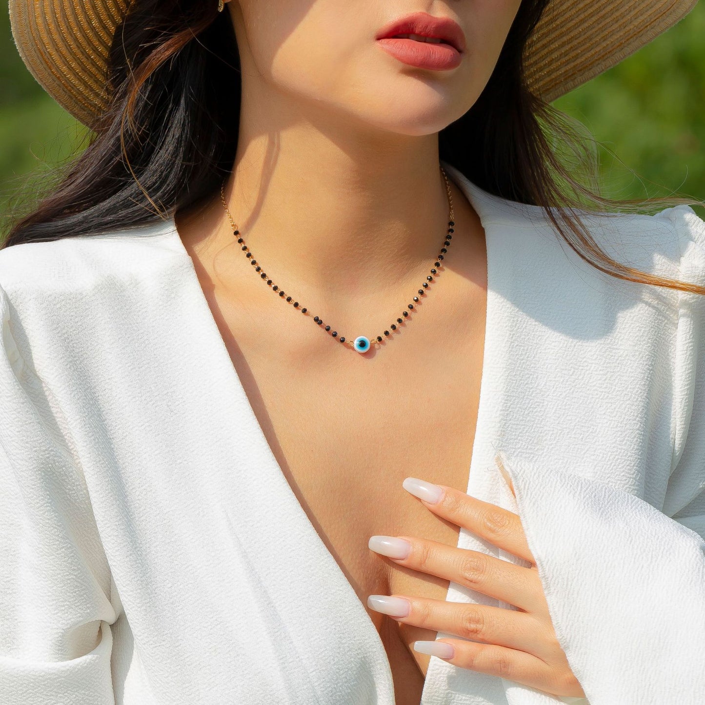 Minimalist Multi-Layer Necklace with Geometric Eye Pendant, Stainless Steel Chain, Tassel Accents, and Electroplated Finish