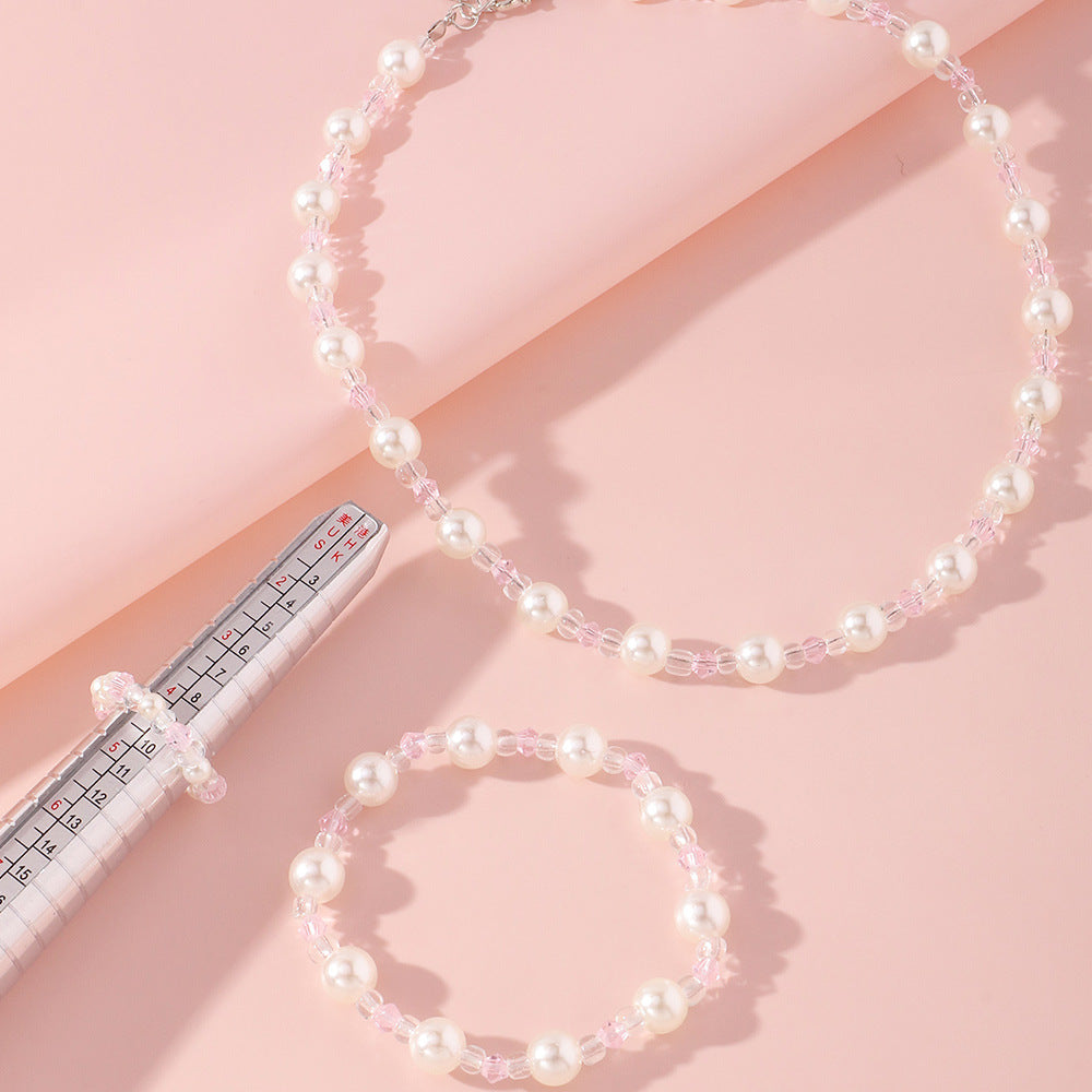 Juego de collar y pulsera de perlas con diseño de dibujos animados para niñas con cuentas de cristal transparente en un dulce y fresco diseño
