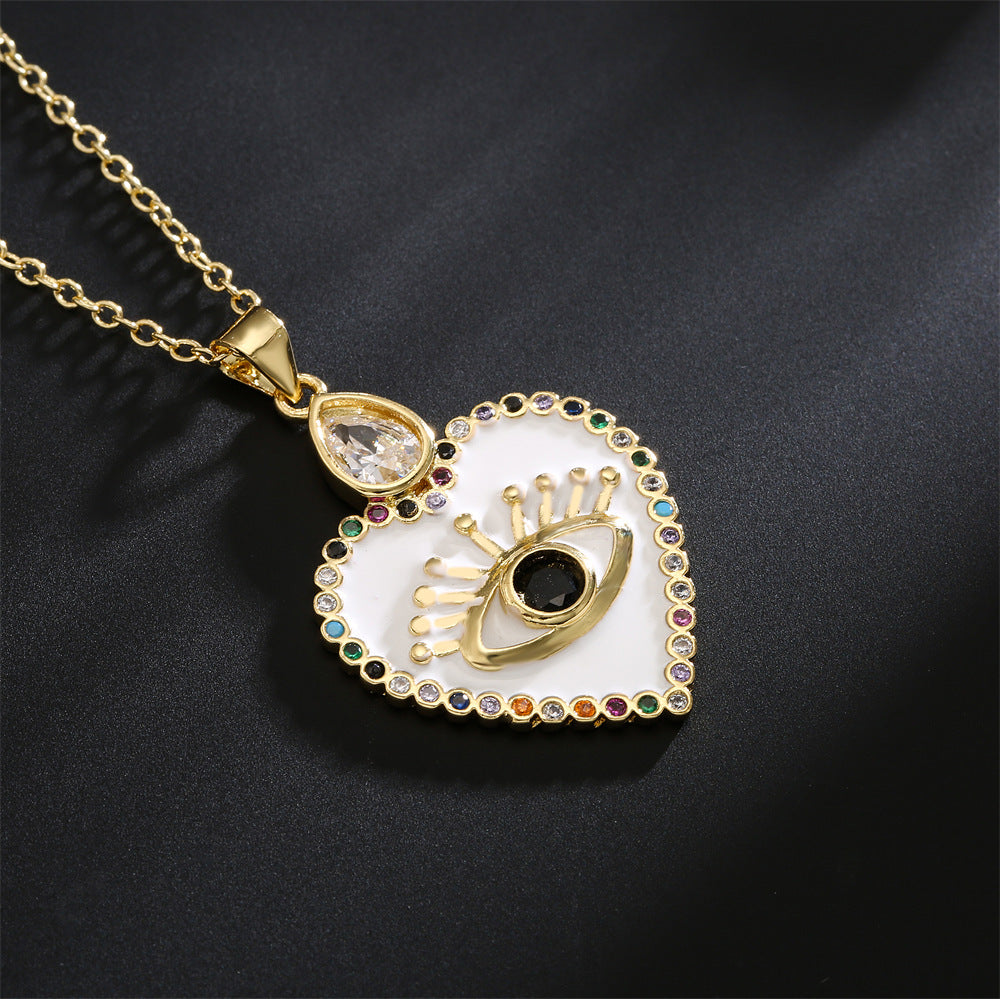 Minimalist Hollow Heart Pendant Necklace in Copper with 18K Gold Plating and Enamel Finish, Accented with Zircon Eyes
