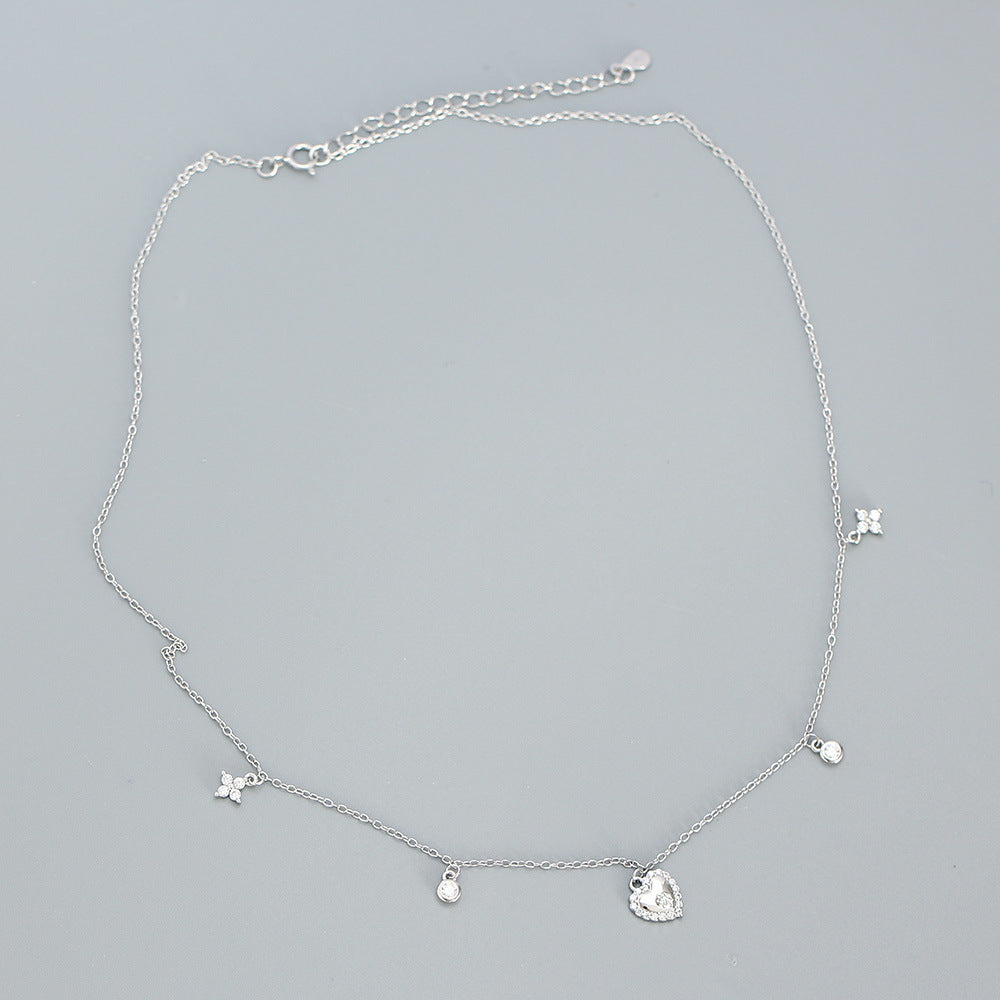 Sweet and Edgy Heart-Shaped S925 Sterling Silver Rhinestone-Inlaid French Clavicle Necklace with Cross Chain for Women