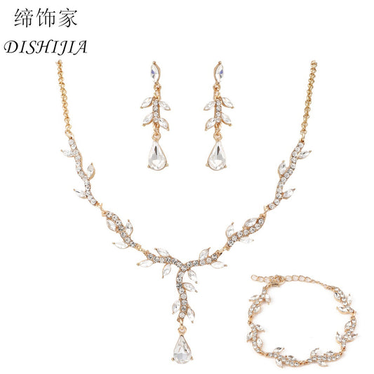 Set di collana, orecchini e bracciale in lega a forma di goccia d'acqua in stile naturale con intarsio di strass da donna con catena ad anelli